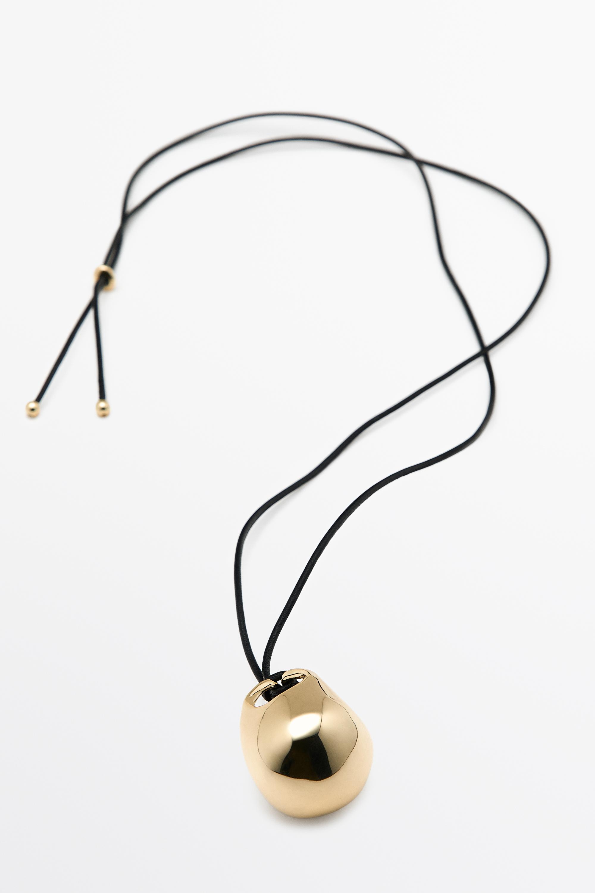 Oval bag pendant necklace